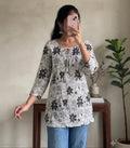 Short Kurti | Ethnic & Western Stylish Floral Printed Cotton Short Kurti for Women & Girls | Casual Daily Wear Tie-Up Neck 3/4 Sleeve Tunic Top for Jeans & Trouser.   1034402074